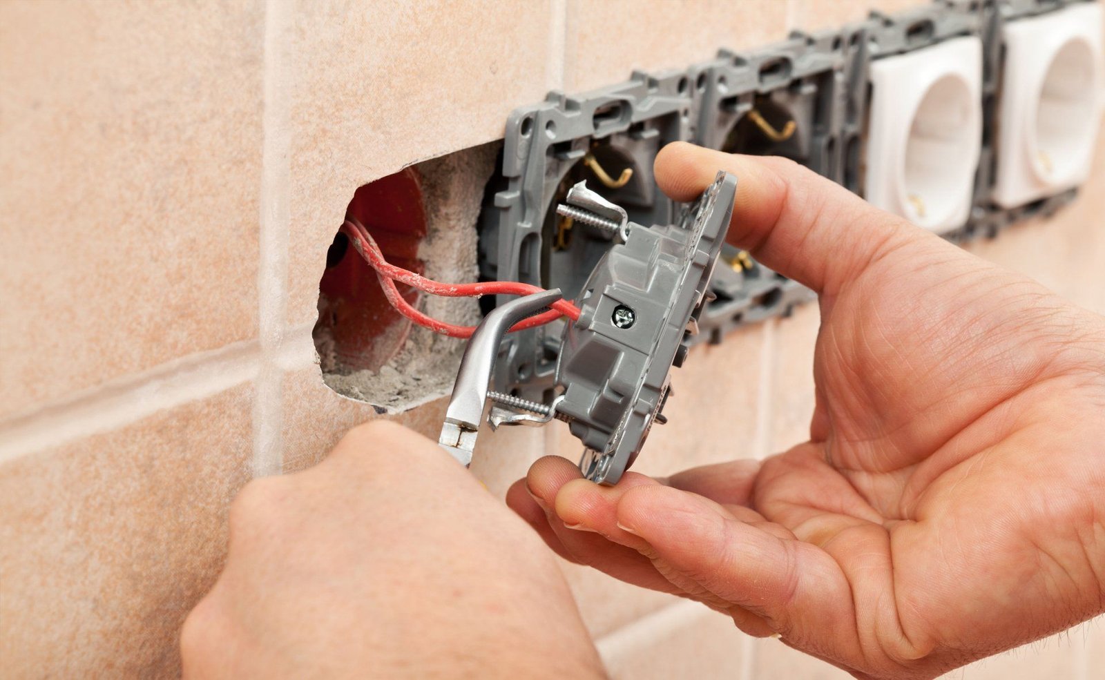 Working on kitchen electric sockets